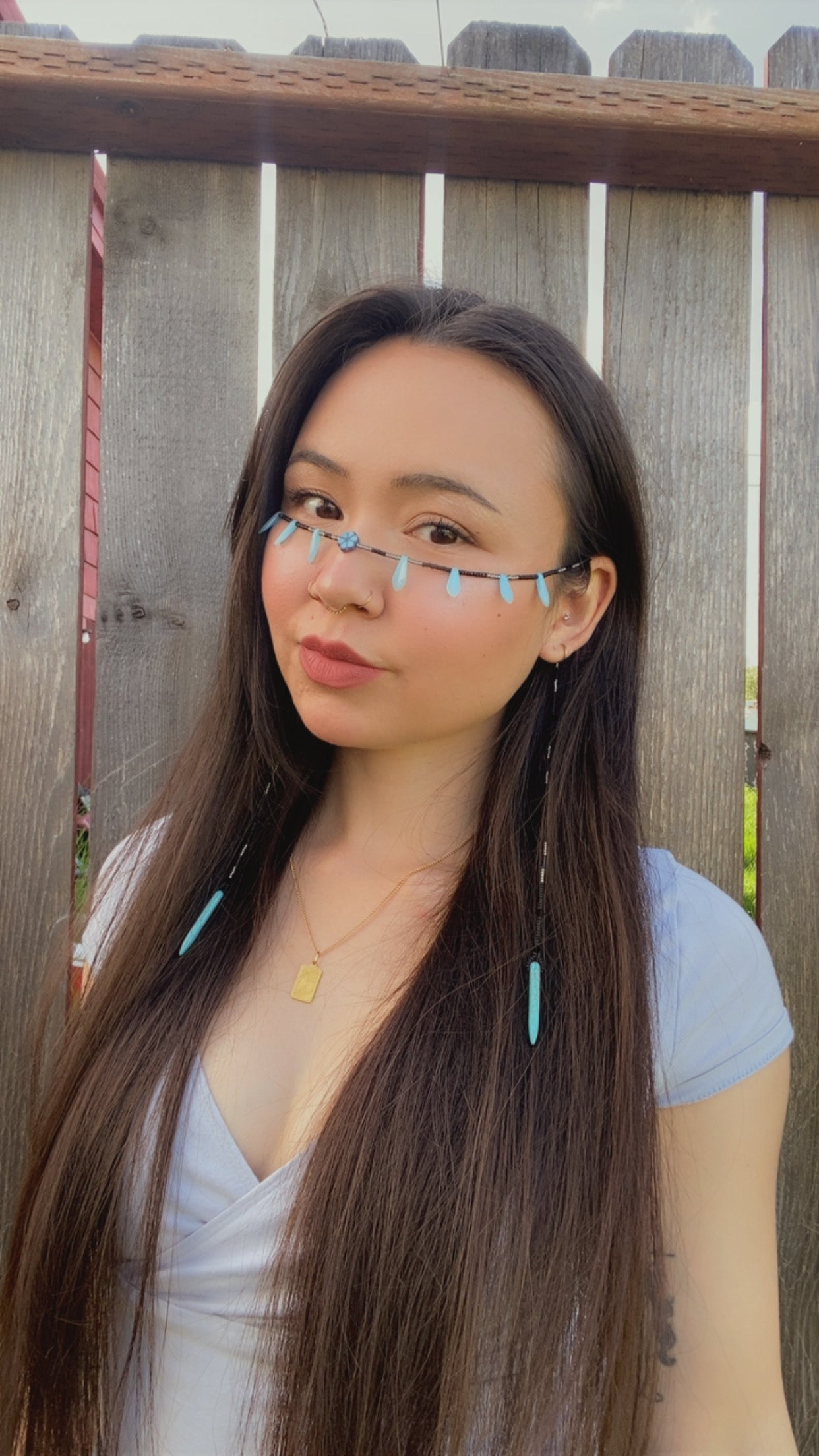 Traditional face tattoo-turquoise